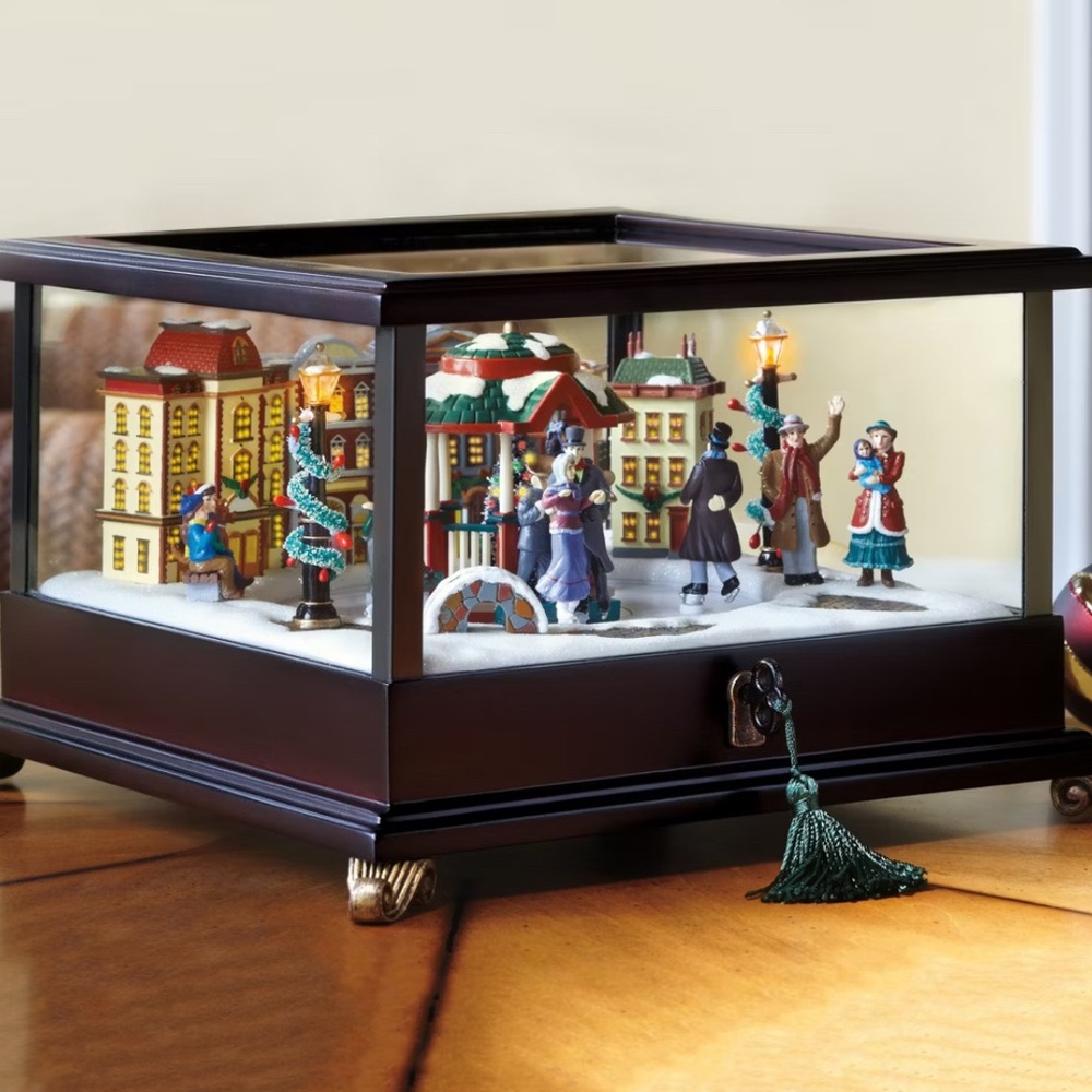 Mr. Christmas Animated Illuminated Music Box with Rotating Skaters